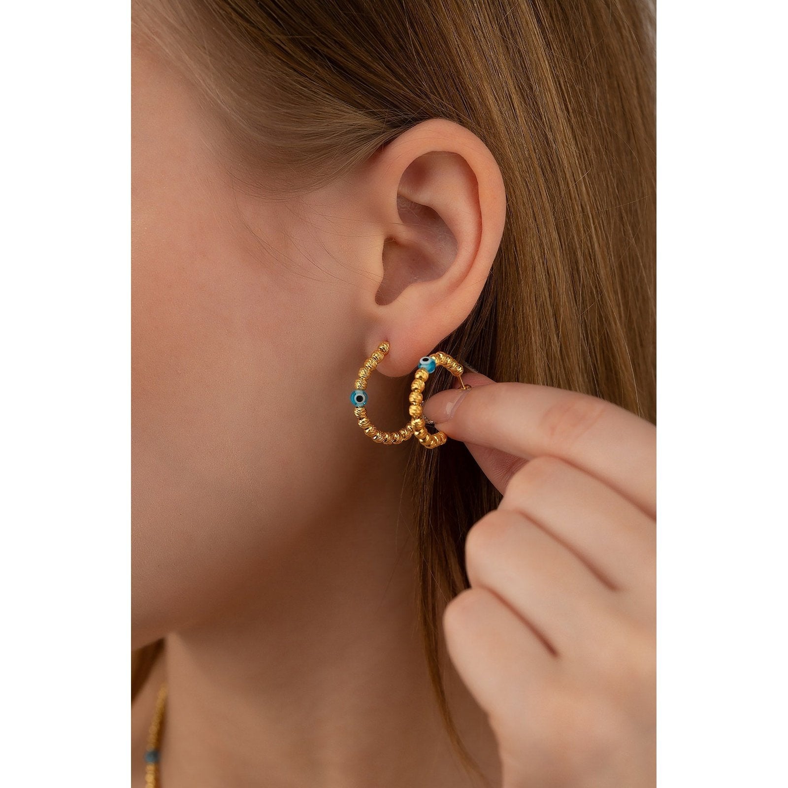 Dorika Nazar Ohrring